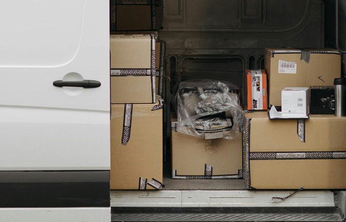 Auto Parts Delivery Van Side Door Open Transport Van Loaded with Auto Parts – Efficient Delivery Services
