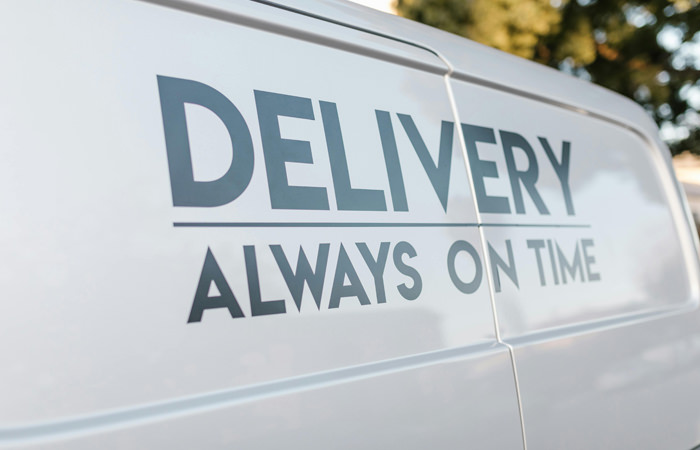 Delivery Always On Time – Branded Transport Van White Transport Van with “Delivery Always On Time” Slogan – Efficient Delivery Services